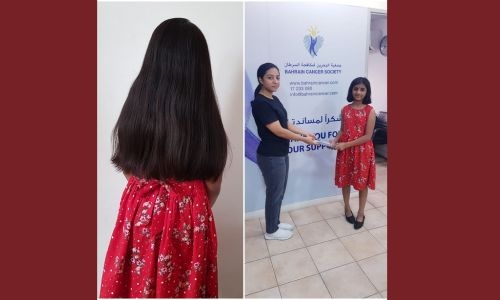 11-year-old girl donates hair to cancer charity