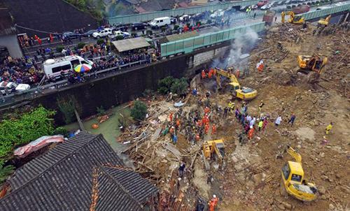 Flood-sparked landslide kills 16 in China Flood-sparked landslide kills 16 in China