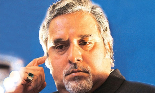 India revokes liquor baron Mallya's passport amid loan scandal India revokes liquor baron Mallya's passport amid loan scandal
