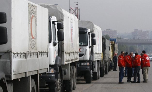 Syria Red Crescent delivers aid to besieged town Syria Red Crescent delivers aid to besieged town