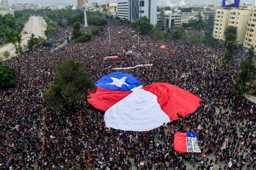 Chile anniversary rallies turn violent as churches burned, police fire tear gas