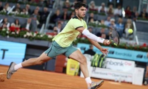 Alcaraz holds off Struff to reach Madrid quarter-finals