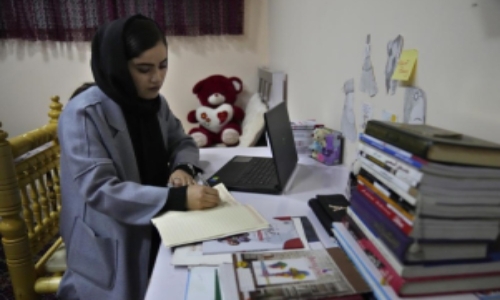 Afghan students return to Kabul University with restrictions