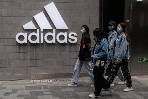 Adidas shares fall as World Cup promotions eat into earnings