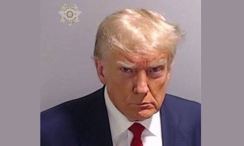Trump arrested in election case, mug shot released