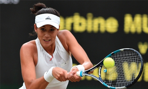 Muguruza moves past Ostapenko