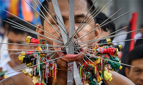Mouthwatering? Thai island hosts cheek-piercing veg festival Mouthwatering? Thai island hosts cheek-piercing veg festival