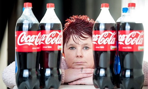 Mum who needs blood transfusions from drinking SIX LITRES of Coke a day
