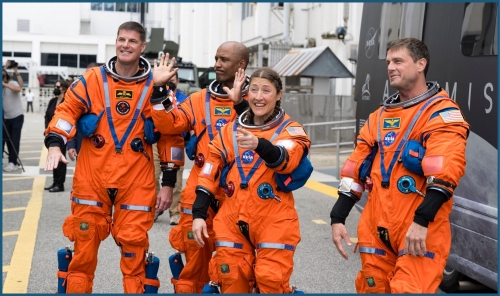 Astronauts strapped in for historic US lunar launch