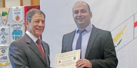 Mr. Fakhro receiving a certificate of thanks from RCM President Hussain Tadayon. Mr. Fakhro receiving a certificate of thanks from RCM President Hussain Tadayon.