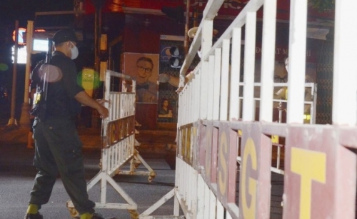 Vietnam locks down its 3rd-largest city as virus cases grow