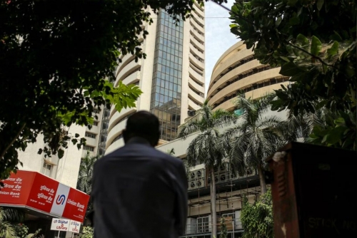 Stock markets sink, dollar rallies on Trump tariffs