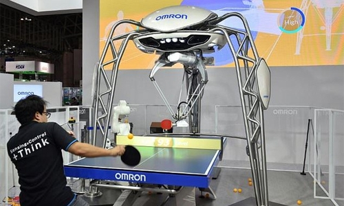 Ping pong robot takes on Olympian at Tokyo tech fair