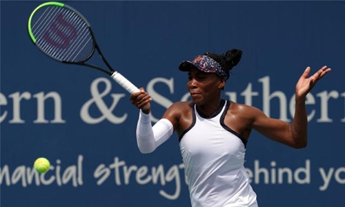 Venus stuns holder Bertens as Serena withdraws