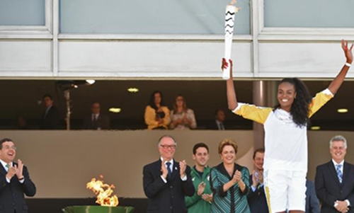 Rousseff vows crisis won't mar Rio Games as flame relay begins