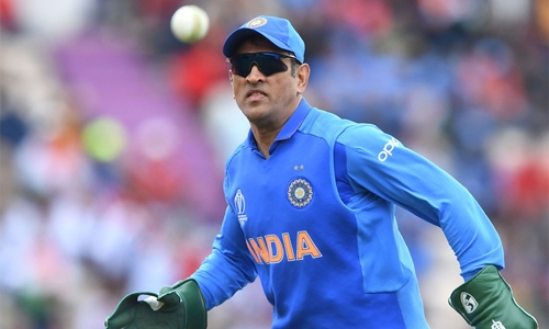 ICC tell India star Dhoni to ditch World Cup gloves