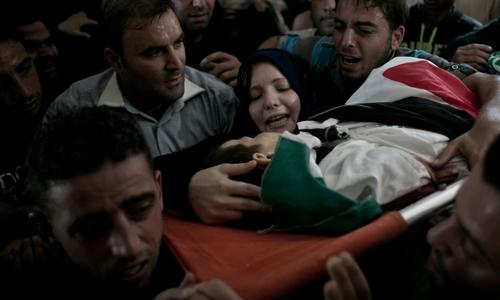 Rights worker shot, wounded by Israeli forces Rights worker shot, wounded by Israeli forces