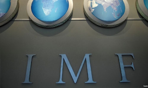 IMF cuts world growth forecast, warns of emerging market risks