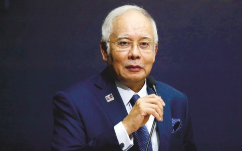 Malaysian king grants house arrest for jailed former PM Najib Malaysian king grants house arrest for jailed former PM Najib