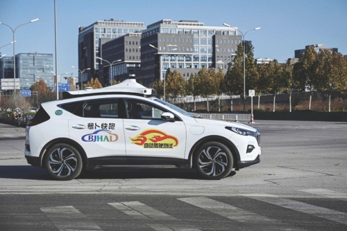 Passengers stranded in moving traffic after robotaxi outage in China's Wuhan