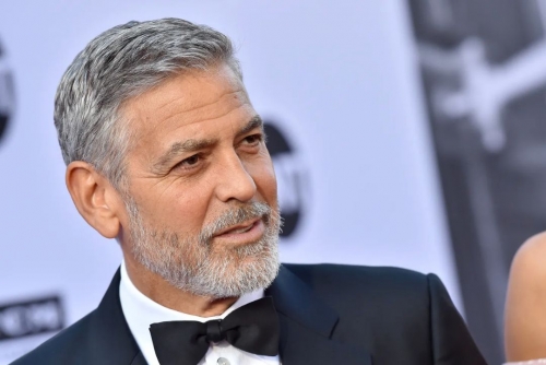 George Clooney is relieved that his twins still like him 