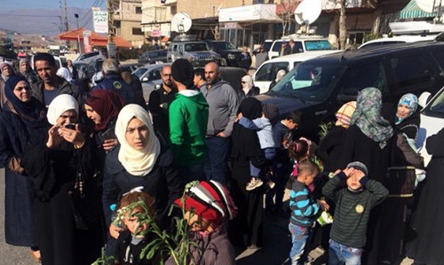 Convoy of evacuated Syria rebels crosses into Lebanon Convoy of evacuated Syria rebels crosses into Lebanon