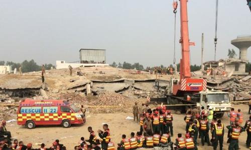 Teenager found alive 50 hours after Pakistan factory collapse