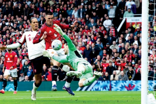 Man United beat Liverpool to secure Champions League place Man United beat Liverpool to secure Champions League place