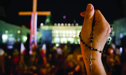 Polish priest, govt supporters try to 'exorcise' newspaper