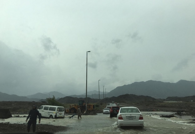 Bus stuck in flooded UAE valley pulled out to safety