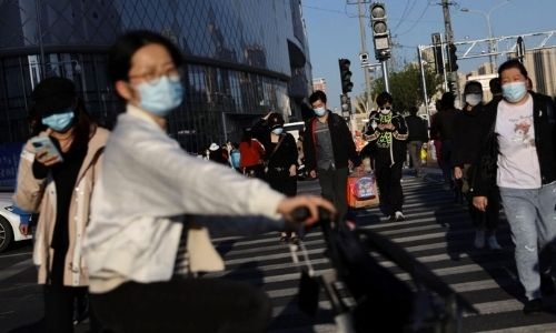 China's Covid death toll rises as Beijing warns of ‘grim’ situation