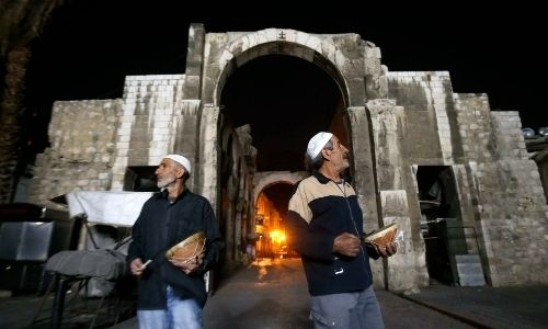 Syria’s Ramadan drummers defiant as tradition wanes
