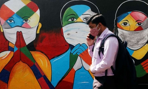 India advises people to wear masks even at home due to Covid surge