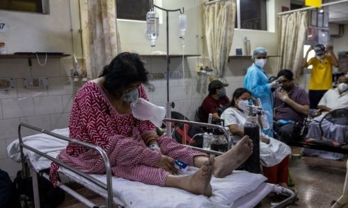 India’s COVID-19 daily cases hold close to record, another state imposes lockdown