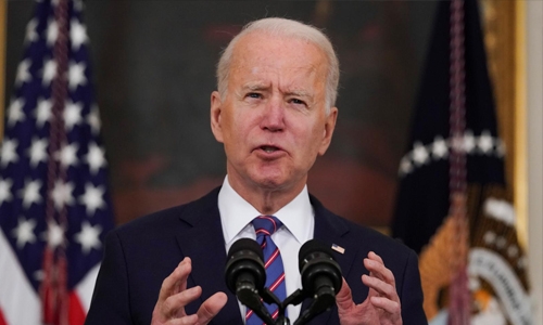 Biden hails strong jobs report, but warns economy could slow if COVID surges again