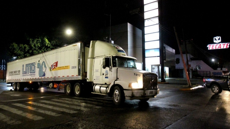 Truck full of bodies draws search for missing relatives Truck full of bodies draws search for missing relatives