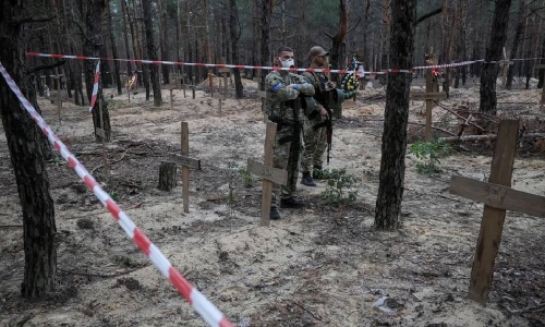 Ukraine says hundreds of bodies found in mass burial site