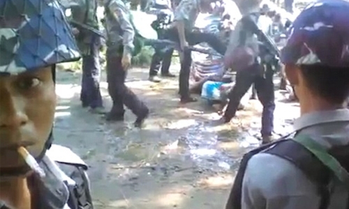 Myanmar detains police over Rohingya abuse video