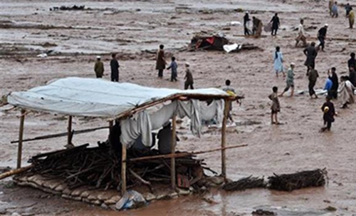Rescuers race to reach thousands stranded by rains in Pakistan