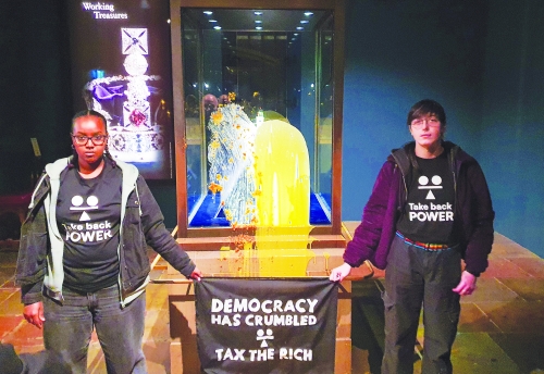 Four arrested after food thrown at Britain's Crown Jewels Four arrested after food thrown at Britain's Crown Jewels