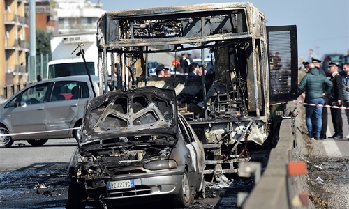 Italy driver hijacks, torches school bus