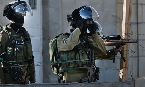 Israeli raid in Ramallah sparks fire, clashes Israeli raid in Ramallah sparks fire, clashes