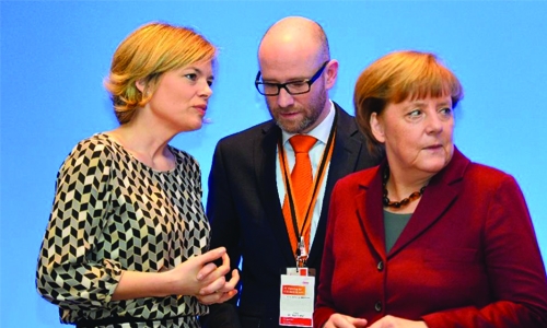 Merkel seeks to silence party rebels over refugee stance Merkel seeks to silence party rebels over refugee stance