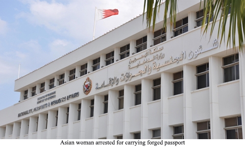 Asian woman arrested for carrying forged passport Asian woman arrested for carrying forged passport