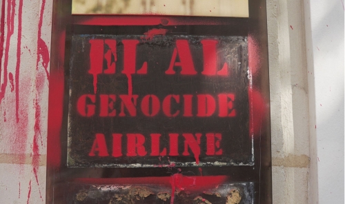 Israeli airline's Paris offices daubed with red paint, slogans Israeli airline's Paris offices daubed with red paint, slogans