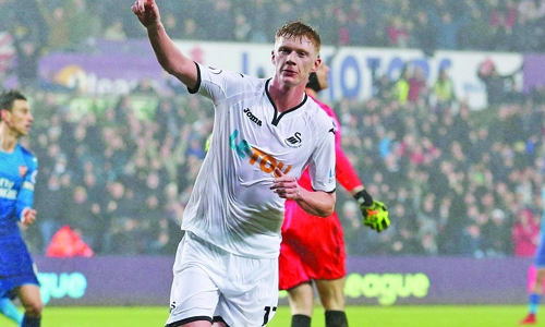 Swansea shock Arsenal