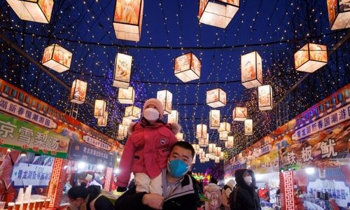 China says Covid outbreak has infected 80% of population