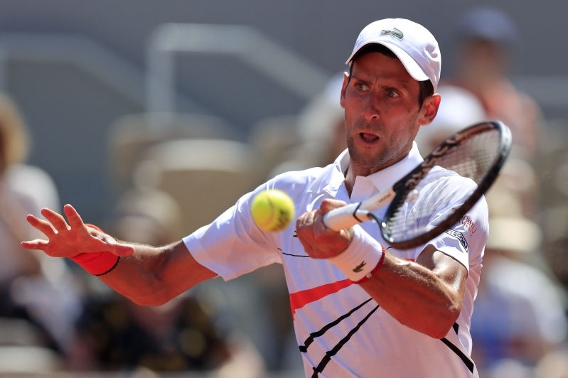 Djokovic cruises into last 16 