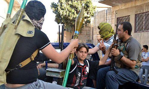 Economic migrants use children as 'human shields' Economic migrants use children as 'human shields'