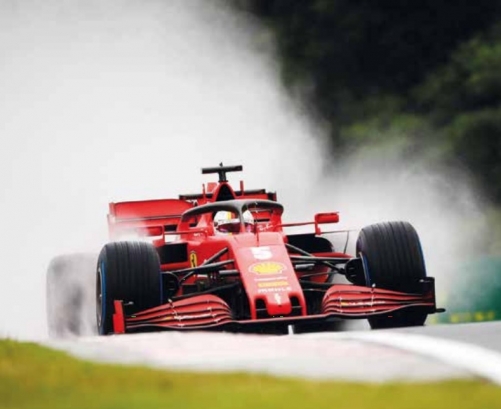 Vettel fastest in wet running